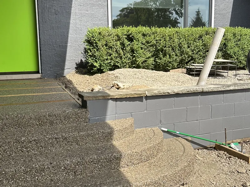 Front entry walkway by A&M Works